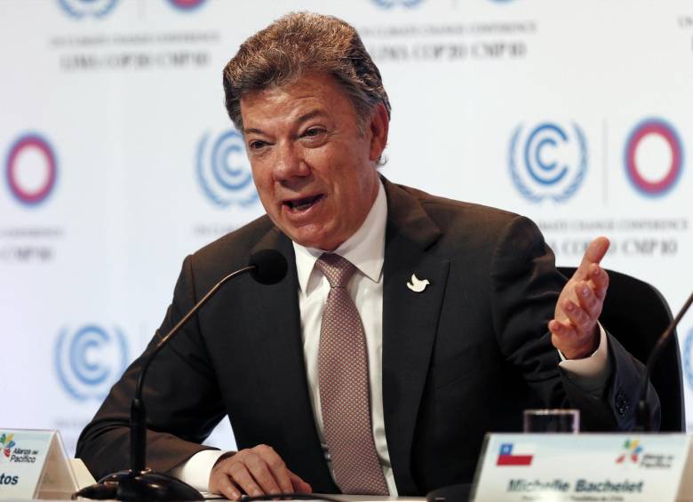 Luego de participar en la Conferencia Mundial sobre Cambio Climático, Santos viajó a E.U. para una conferencia de la fundación Clinton. FOTO AP 