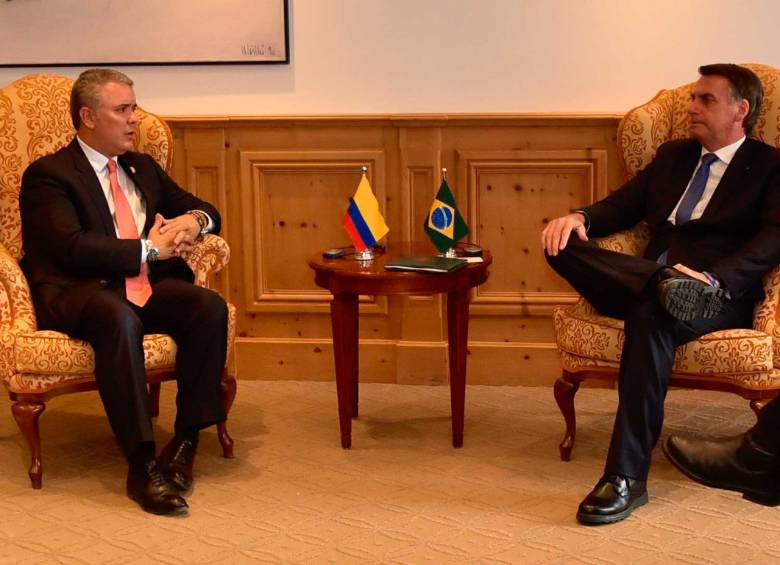 El presidente Iván Duque y su homólogo brasileño, Jair Bolsonaro, durante un encuentro en Suiza en enero. FOTO: COLPRENSA