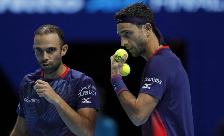 Los colombianos Juan Sebastián Cabal y Robert Farah, juegan este sábado por los octavos de final del US Open. FOTO AFP