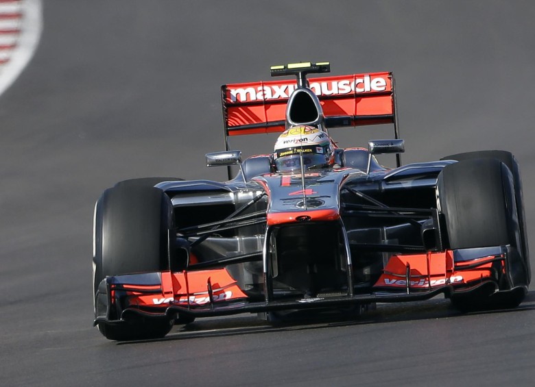 McLaren se debate entre la veteranía de Jenson Button, de 34 años, y el potencial de Magnussen, de 22, para formar pareja con la posible llegada de Alonso. FOTO ARCHIVO. 