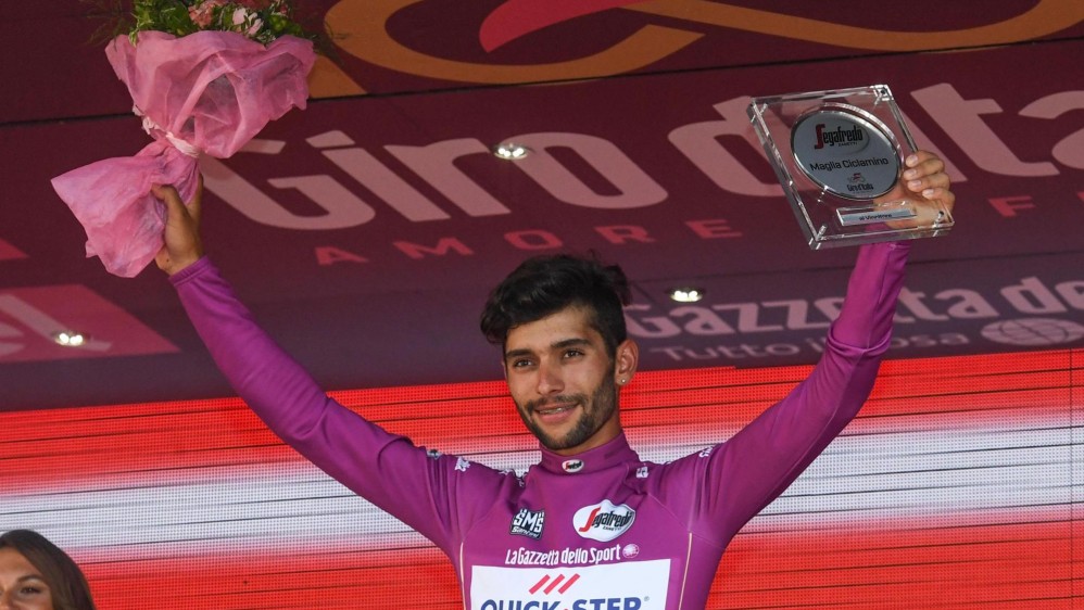 El antioqueño Fernando Gaviria, que por primera vez corría en una de las tres vueltas grandes, se quedó con la camiseta del mejor ciclista por puntos. FOTO EFE